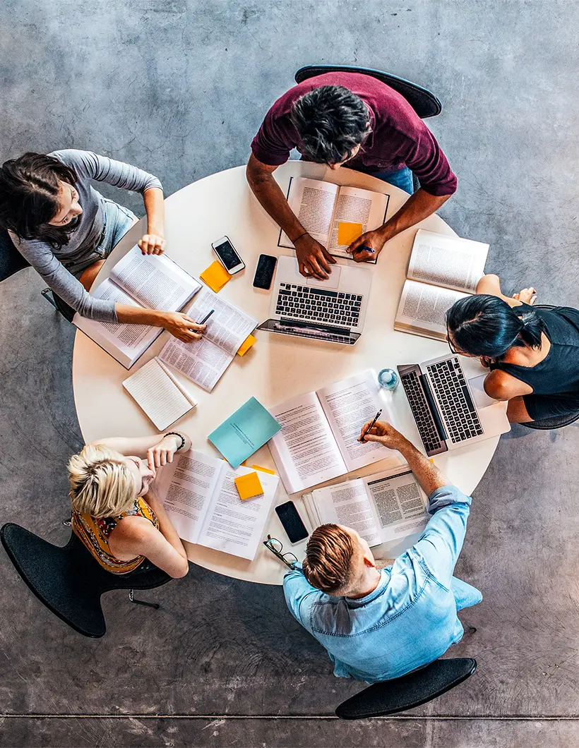 Group of students studying at table