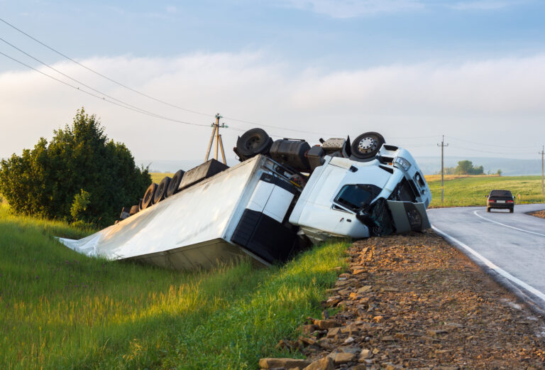 Semi-truck rollover on freeway